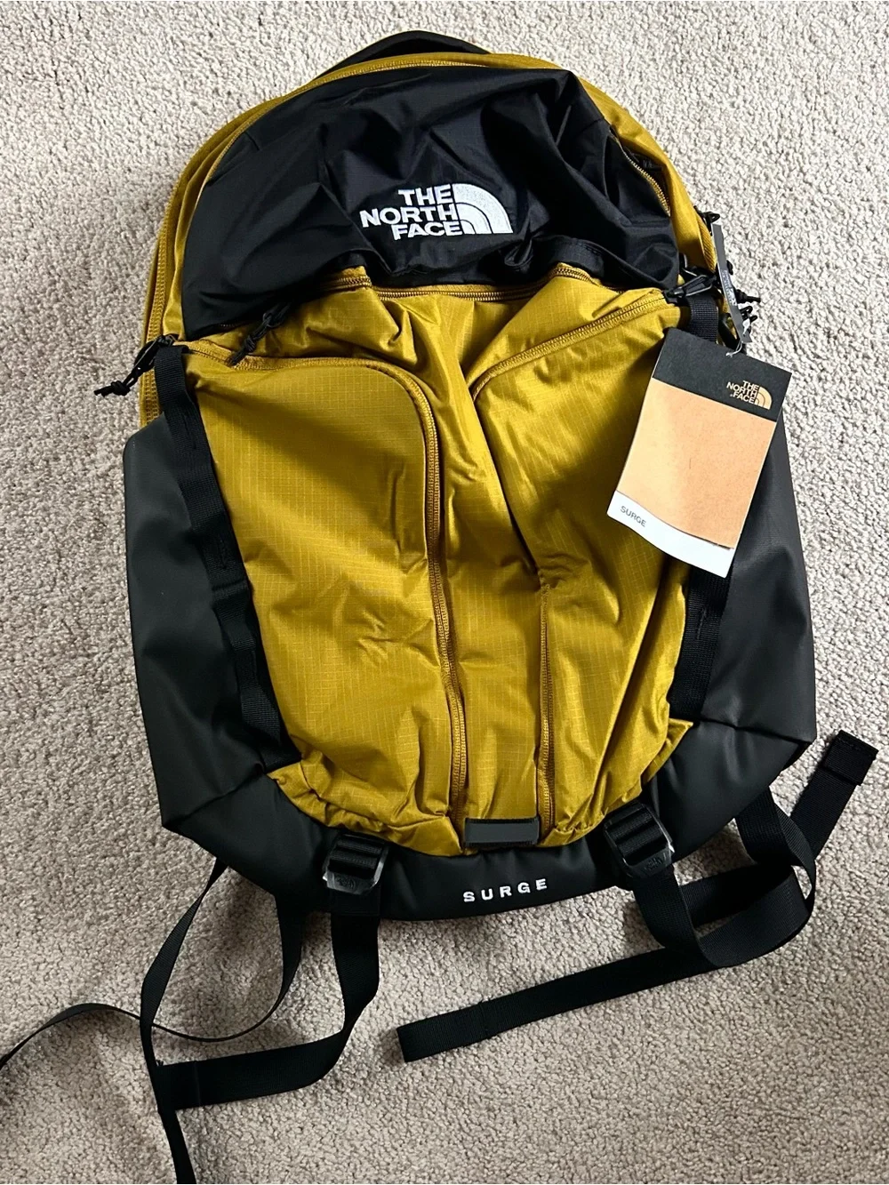 The North Face TNF Surge Unisex Backpack Deep Dijon Black NWT